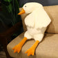 Treat yourself to a moment of softness with this giant goose-shaped cushion plush. 