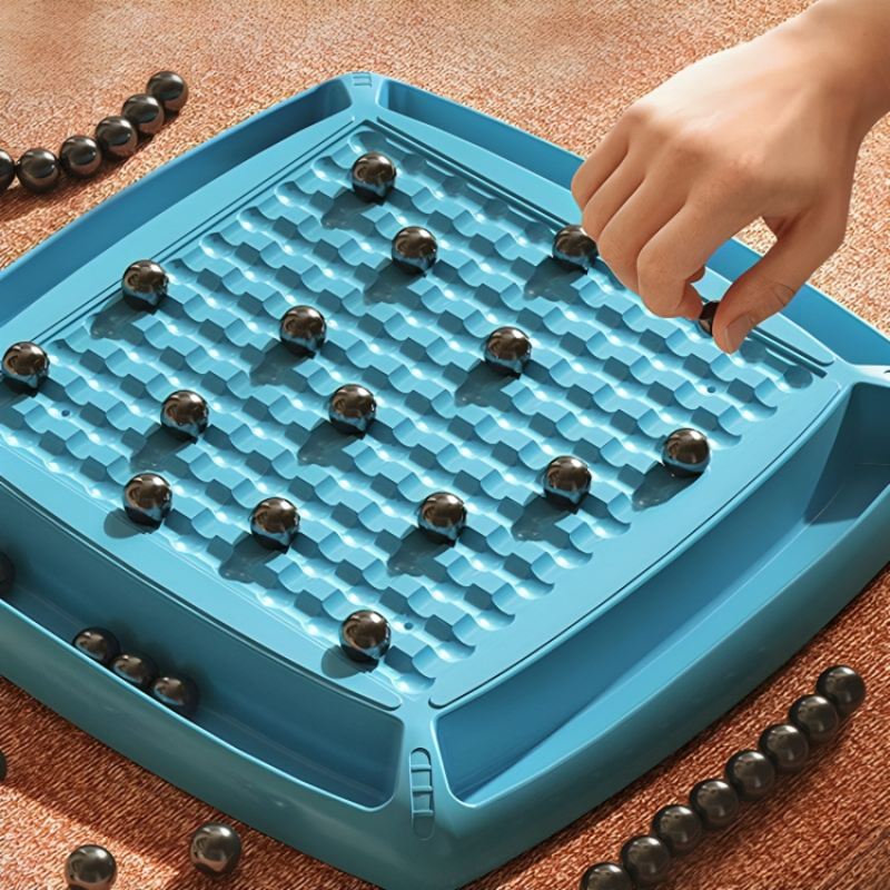 Viel Spaß mit der Familie bei einem magnetischen Geschicklichkeitsspiel 